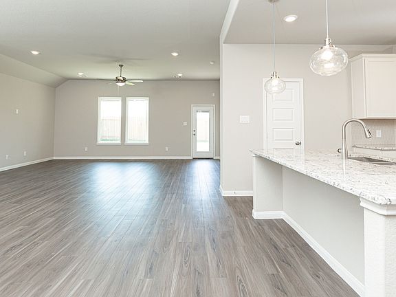 Dining Area to Kitchen and Family Room