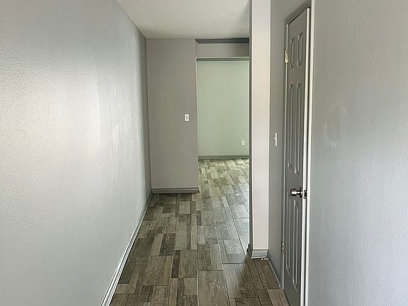 Entry hallway with half bathroom