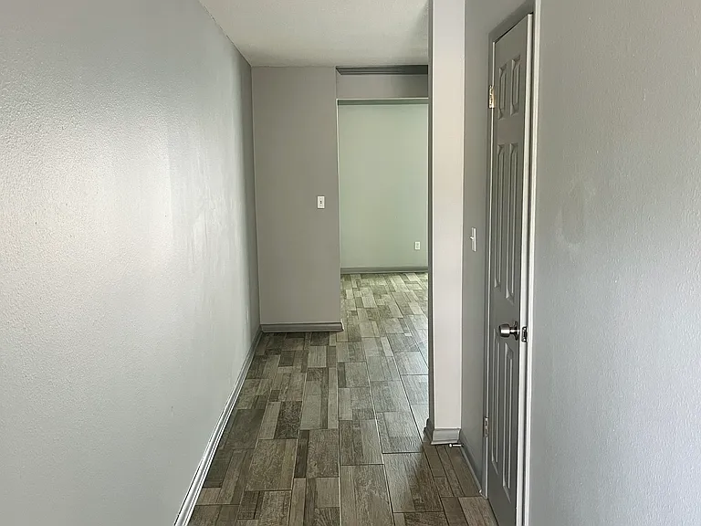 Entry hallway with half bathroom