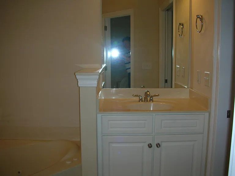 Second vanity to right of the tub.