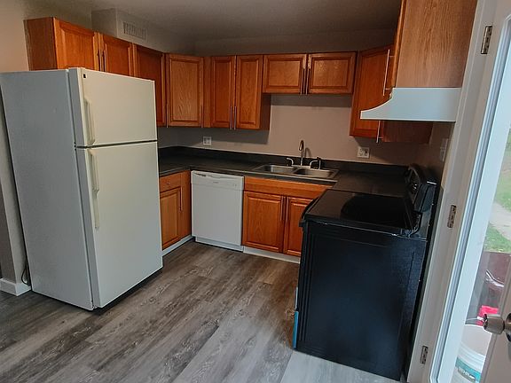 Newly renovated kitchen with brand new flat top stove