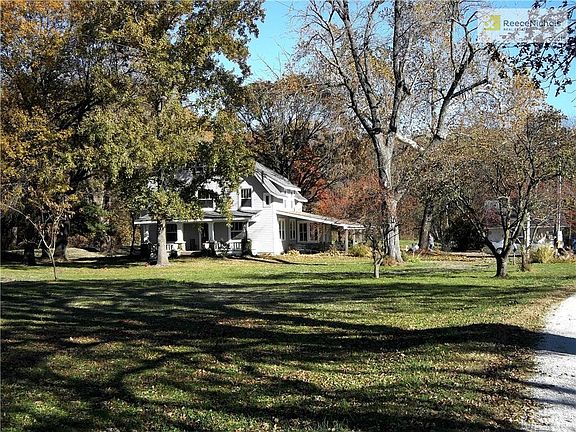 13 peaceful acres with mature trees .