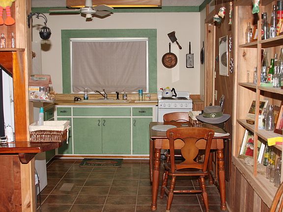 kitchen
						:
						Tile floors--new stove & is right off from living room area and spare bedroom
