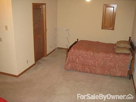 Master Bedroom
						:
						Looking into bedroom from doorway. That is a King Size Bed
