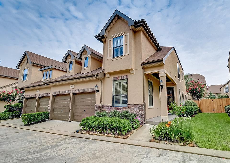 Outstanding private location on a back street of this gated community offering a nice greenspace on the side. Additional parking at the end of the streets.