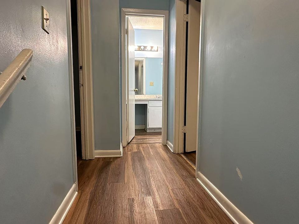 second floor hallway, looking into the upstairs bathroom, with newly replaced shower, will clean the tub and shower wall in a few hours