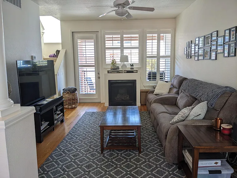 living area with electric fireplace
