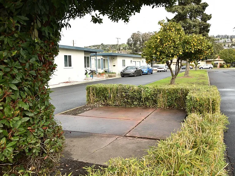exterior driveway into the community