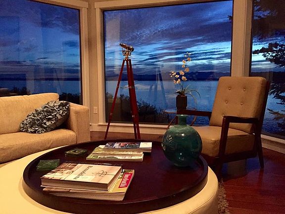 Living room in the evening, relax in front of a cozy firepla