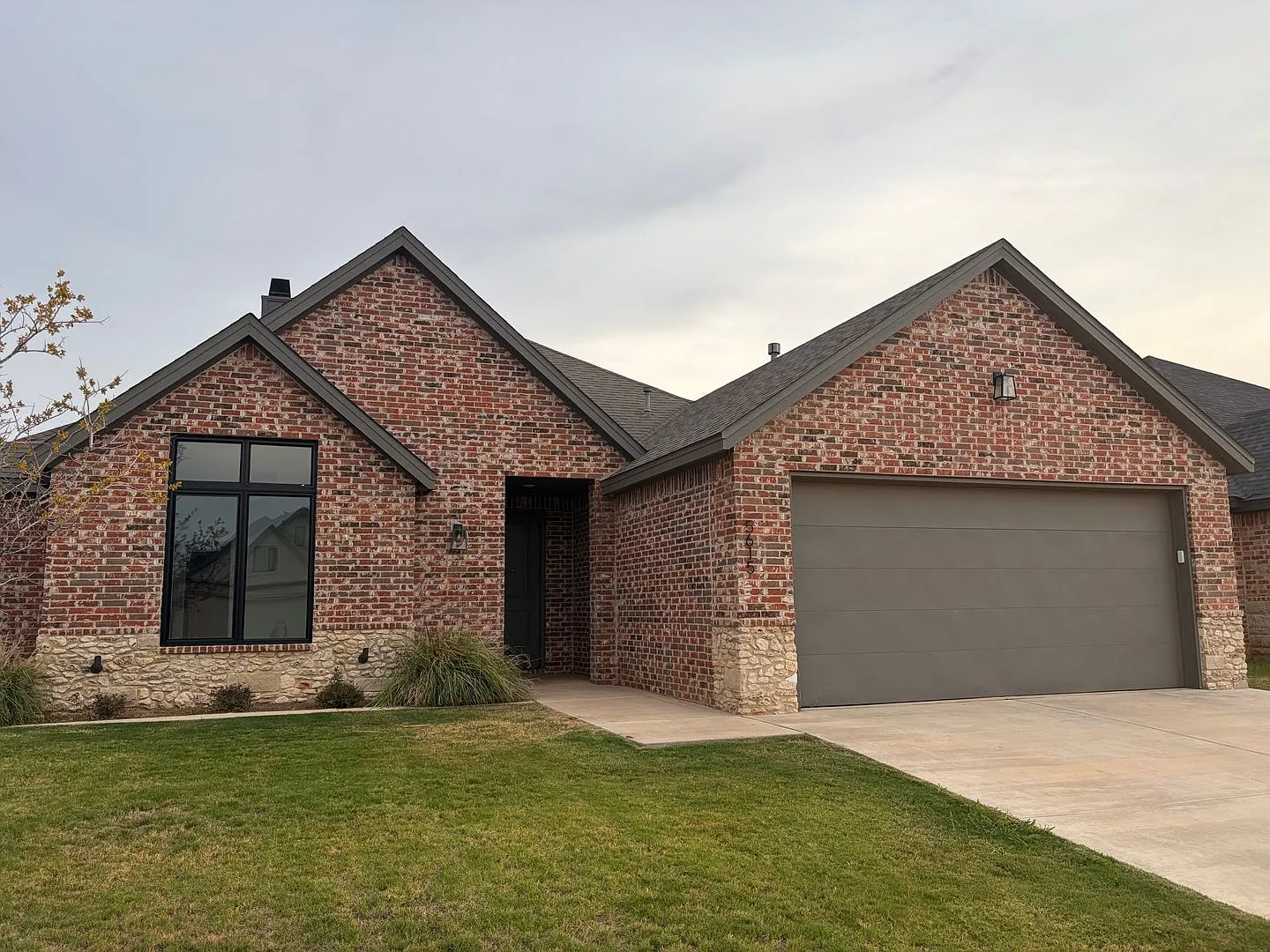 Spacious 4-Bedroom Home with Open-Concept Living & Covered Patio — Photo 3