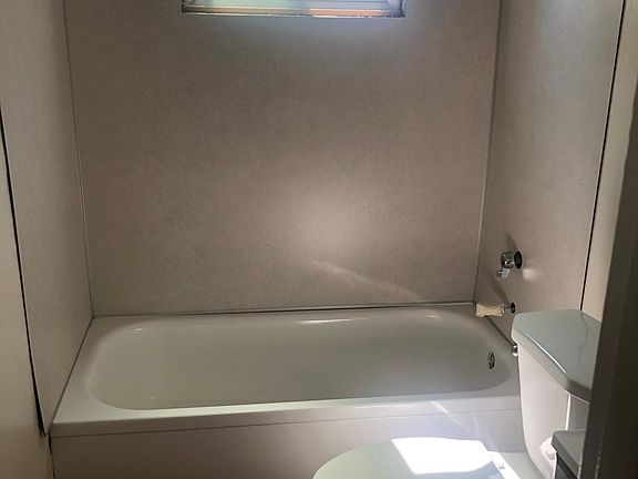 , refinished tub, new tub surround
