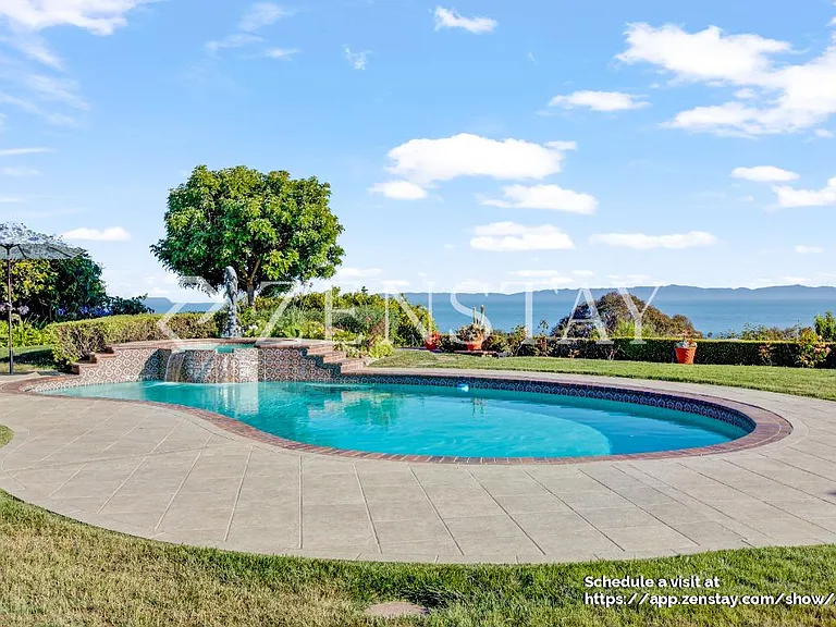 Resort-style circular pool as the centerpiece of the backyard