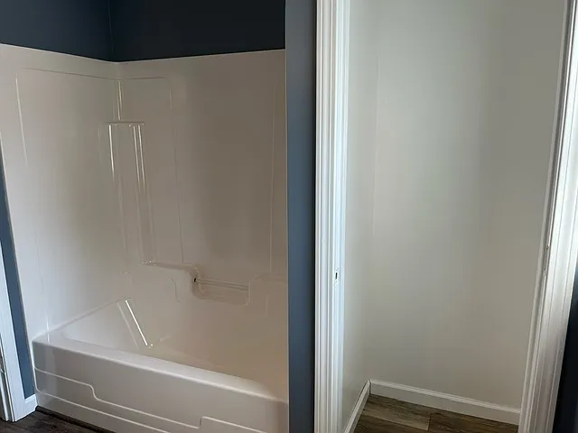 Linen closet in the bathroom. Shelves and door not shown.
