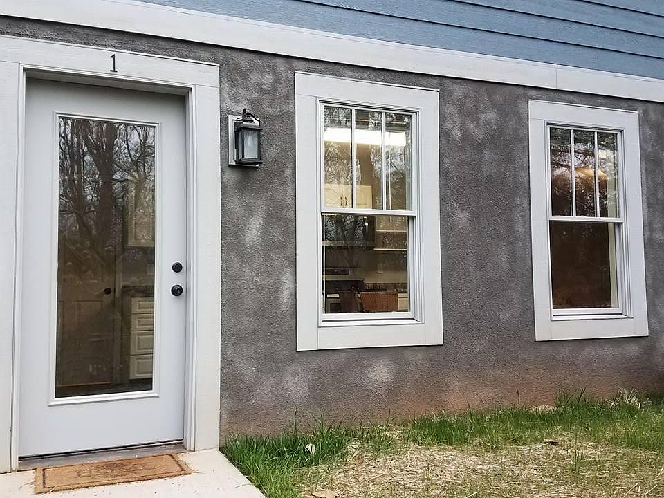 Private entrance with walkway to own driveway and parking space