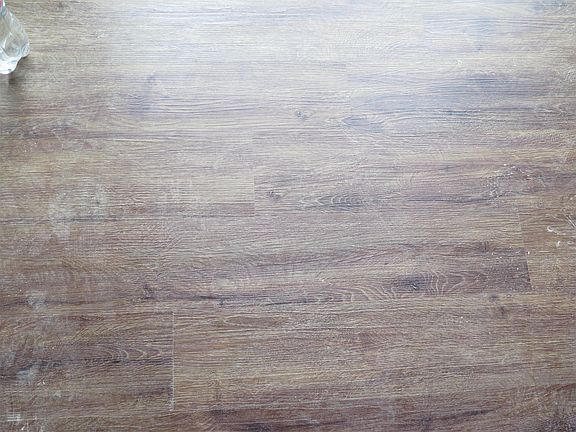 Beautiful new flooring throughout the living room, kitchen, and foyer!