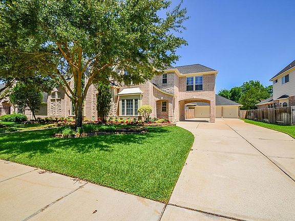 Beyond the porte-cochere is the large detached garage with a 10 ft. extension. Garage is 29x27.