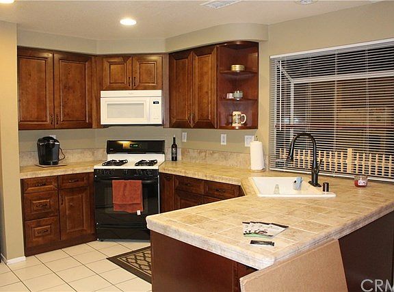 Open Kitchen with some new appliances breakfast counter