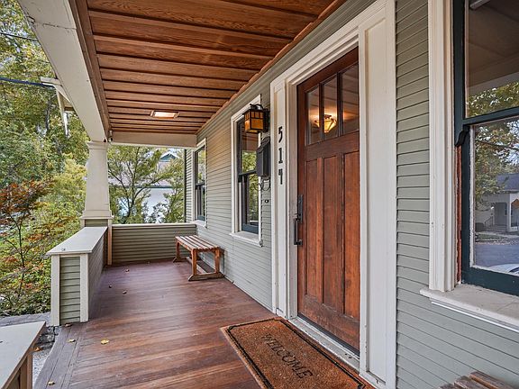 Wide front porch extends the entire front length of the house.