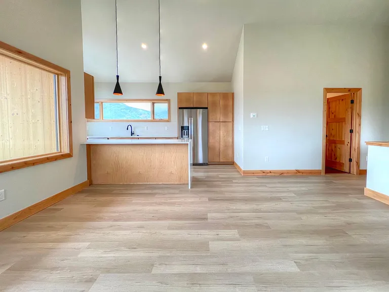 open living room/dining with west facing bay window