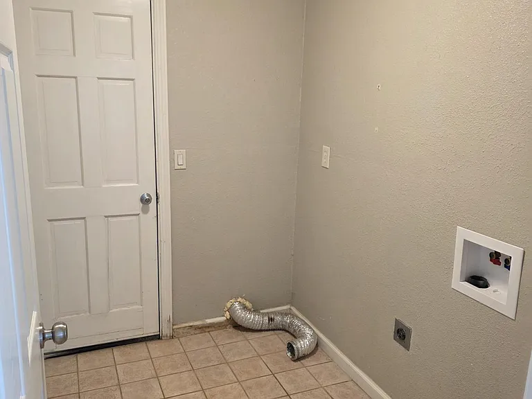INSIDE LAUNDRY ROOM