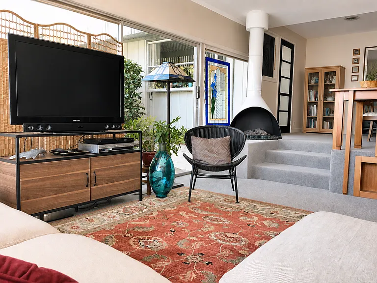 sunken family room with dining or office area area up above
(candles only in this fireplace)