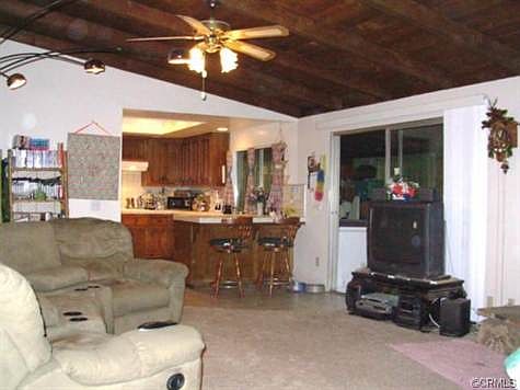 Den w/ wood beamed ceilings!