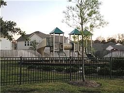 Gated pocket park for the kids to enjoy just across the street!
