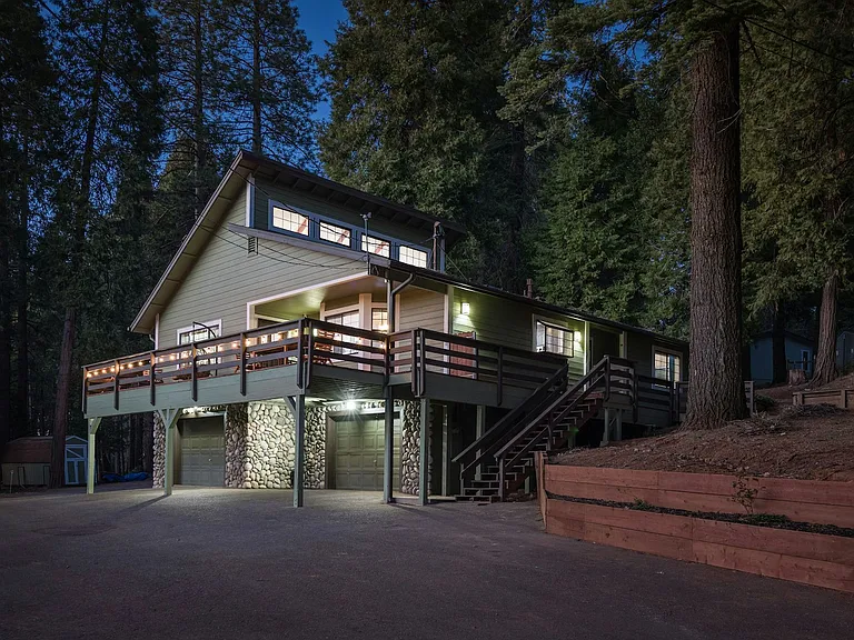 Peaceful home with access to three car garage.