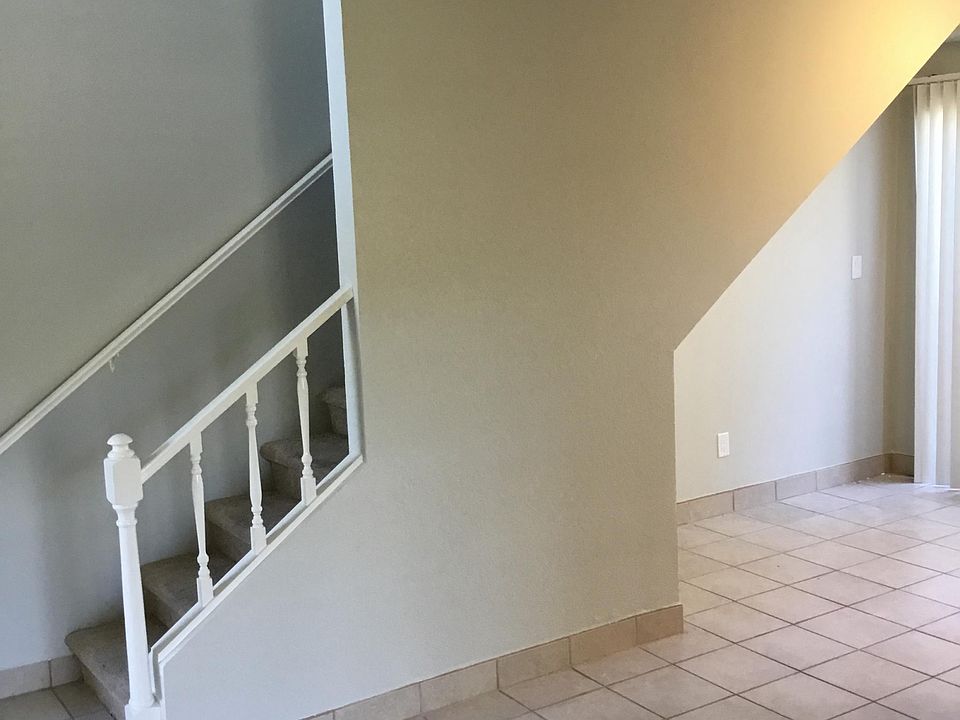 Small dining area opens to small private patio.