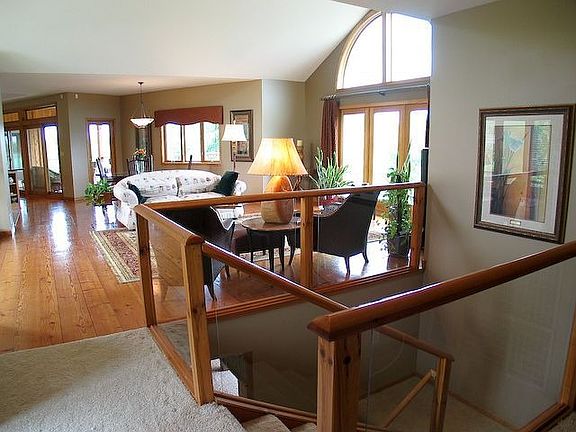 Open floor plan and warm resawn timber floors.