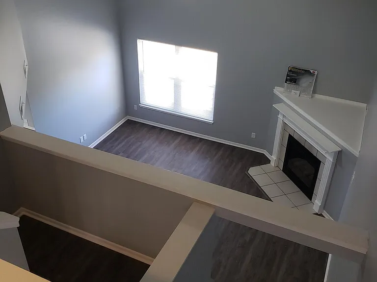 View of living room from 2nd floor reading nook