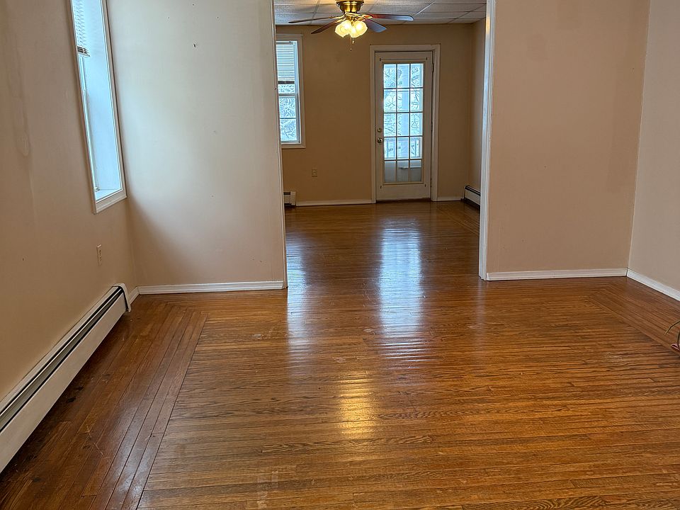 Dining room or family room looking toward living room and balcony door