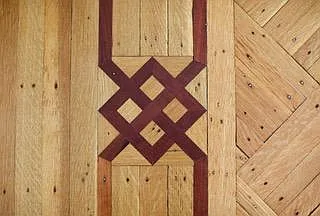 detail of mahogany inlay in refinished floors
