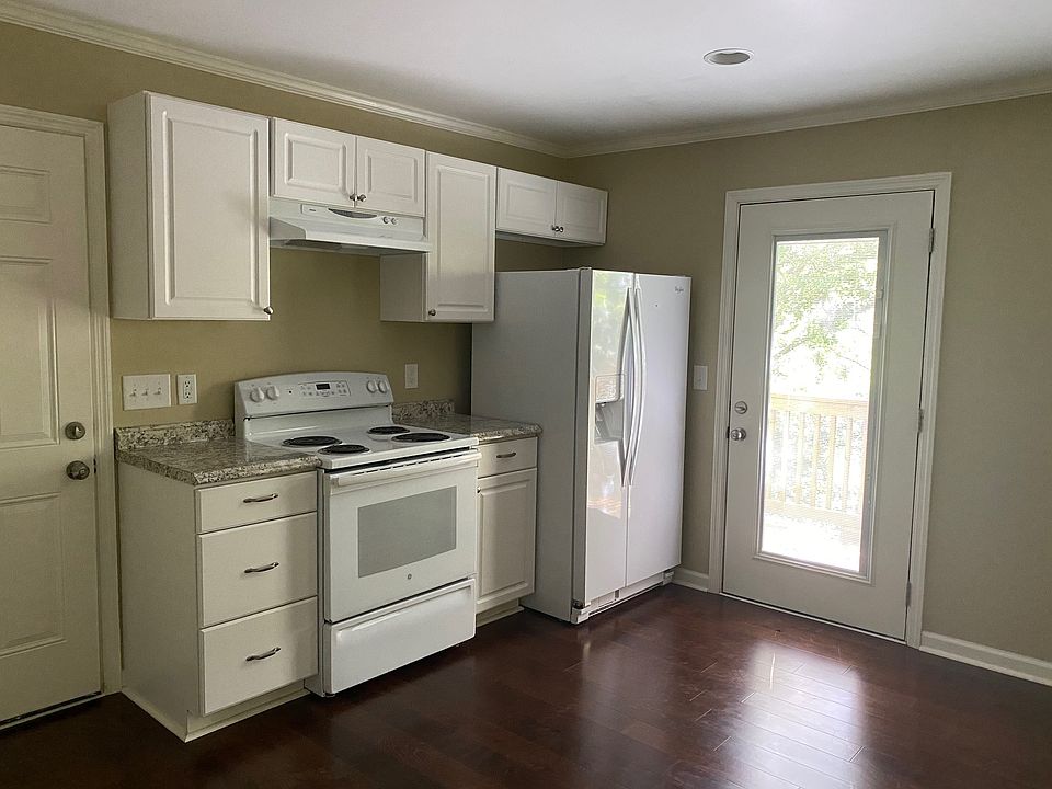 The door from the kitchen leads to a balcony
