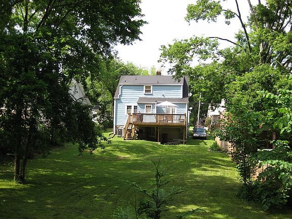 New deck from the back yard (w/pear trees)