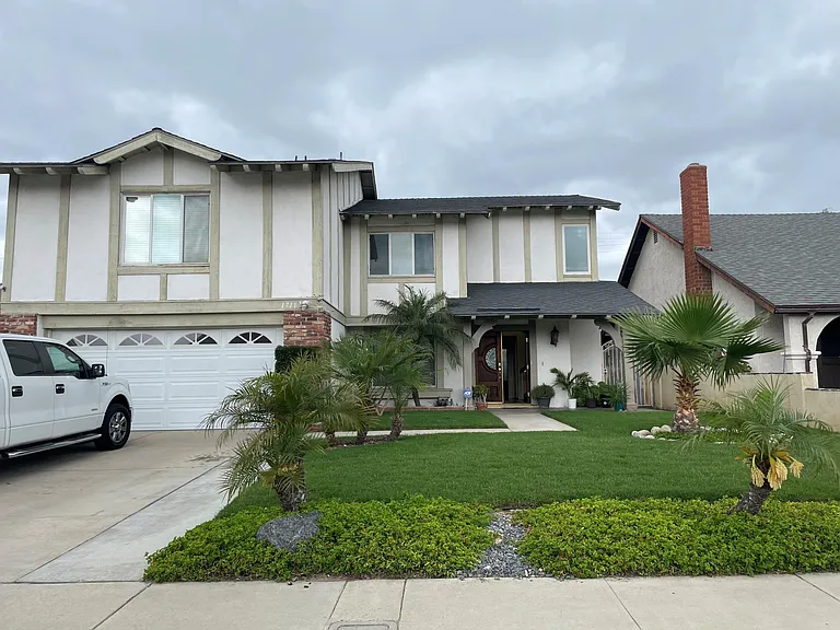 Two car garage and gorgeous front yard