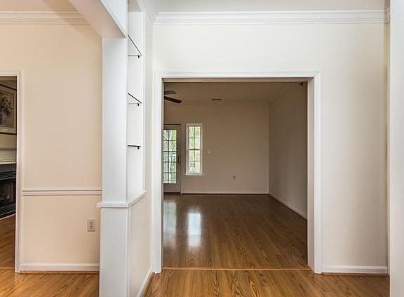 Spacious, welcoming foyer with dining room to left