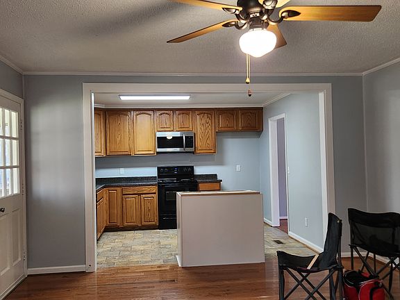 Kitchen opening into den.