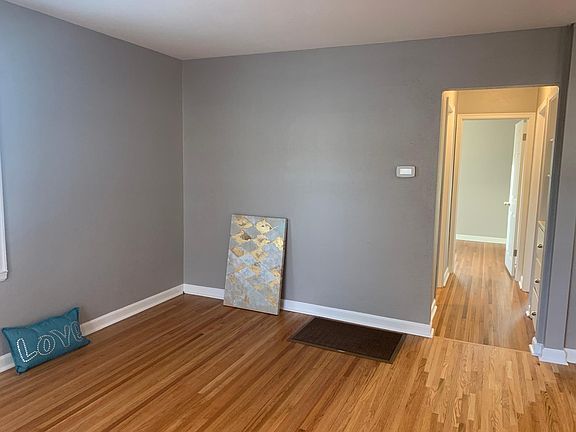 Updated gray walls with newly painted white trim.