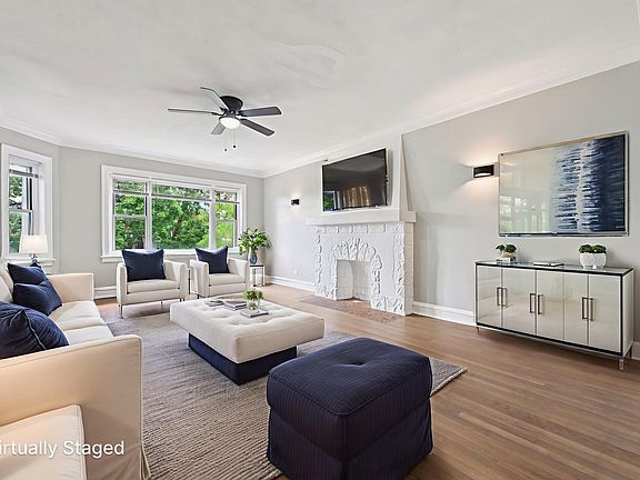 Photo is from a similar unit in the building...