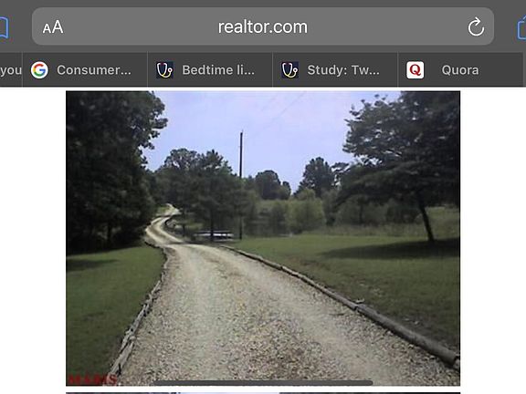 view of drive up from house