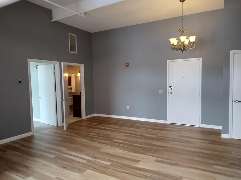 Main living area. Full bath to right. Master bedroom also on right.
