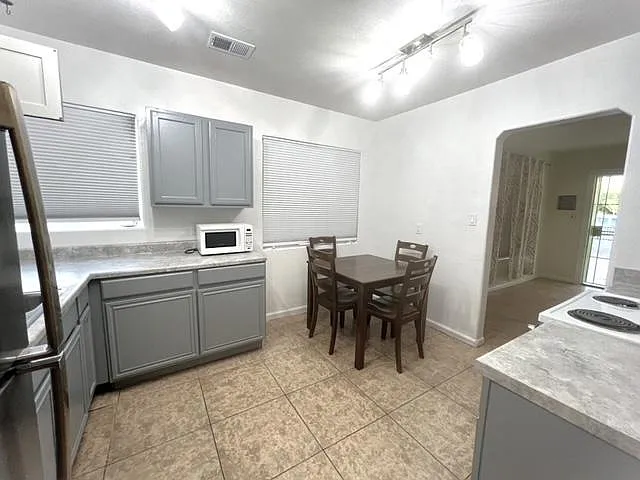 Dining area with table and chairs
