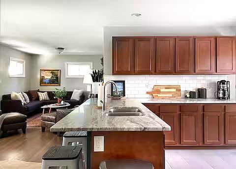 Granite countertops and ample work space for cooking and eating