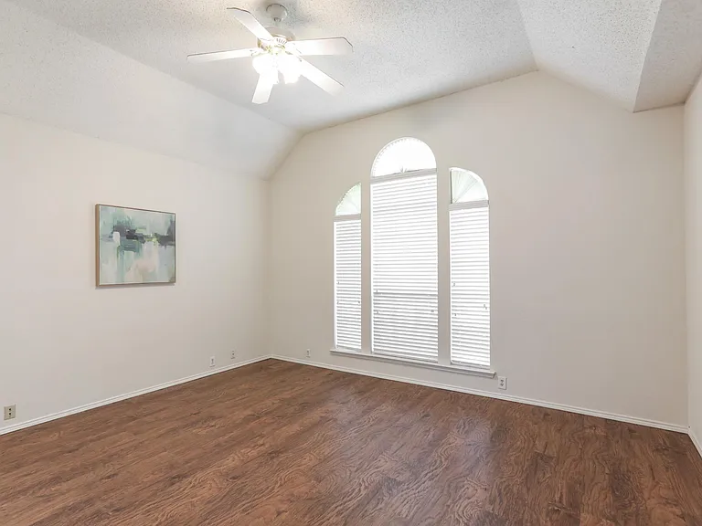 Large primary bedroom with nice light