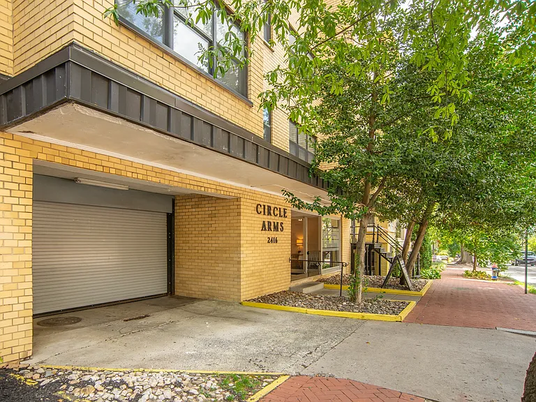 Front Facade with Parking Entrance