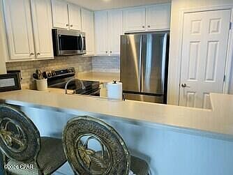 3rd image of 5115 Gulf Dr Unit 705