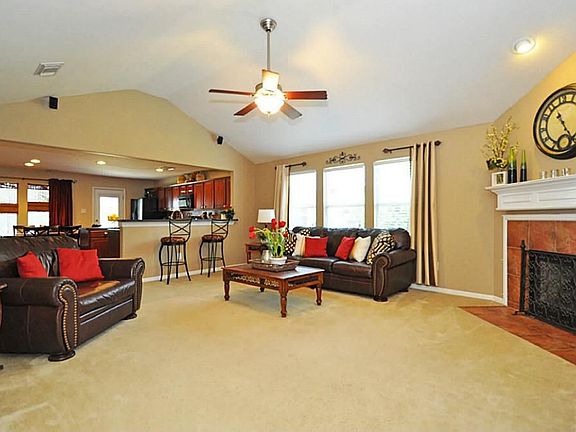 Entertaining will be easy in this spacious living room that is already prewired for surround sound.