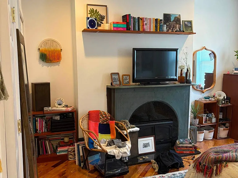 Upstairs bedroom with fireplace