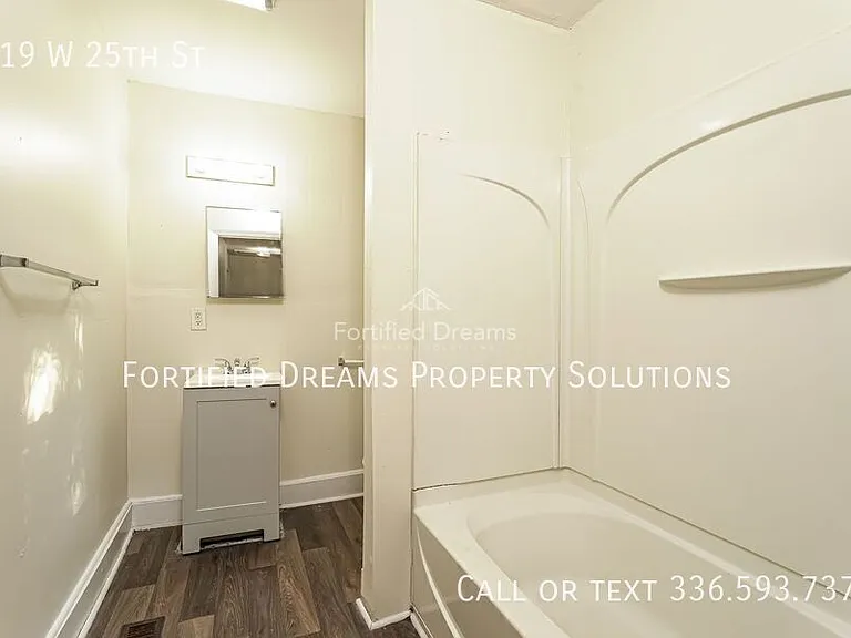319 W 25th St — Photo 11